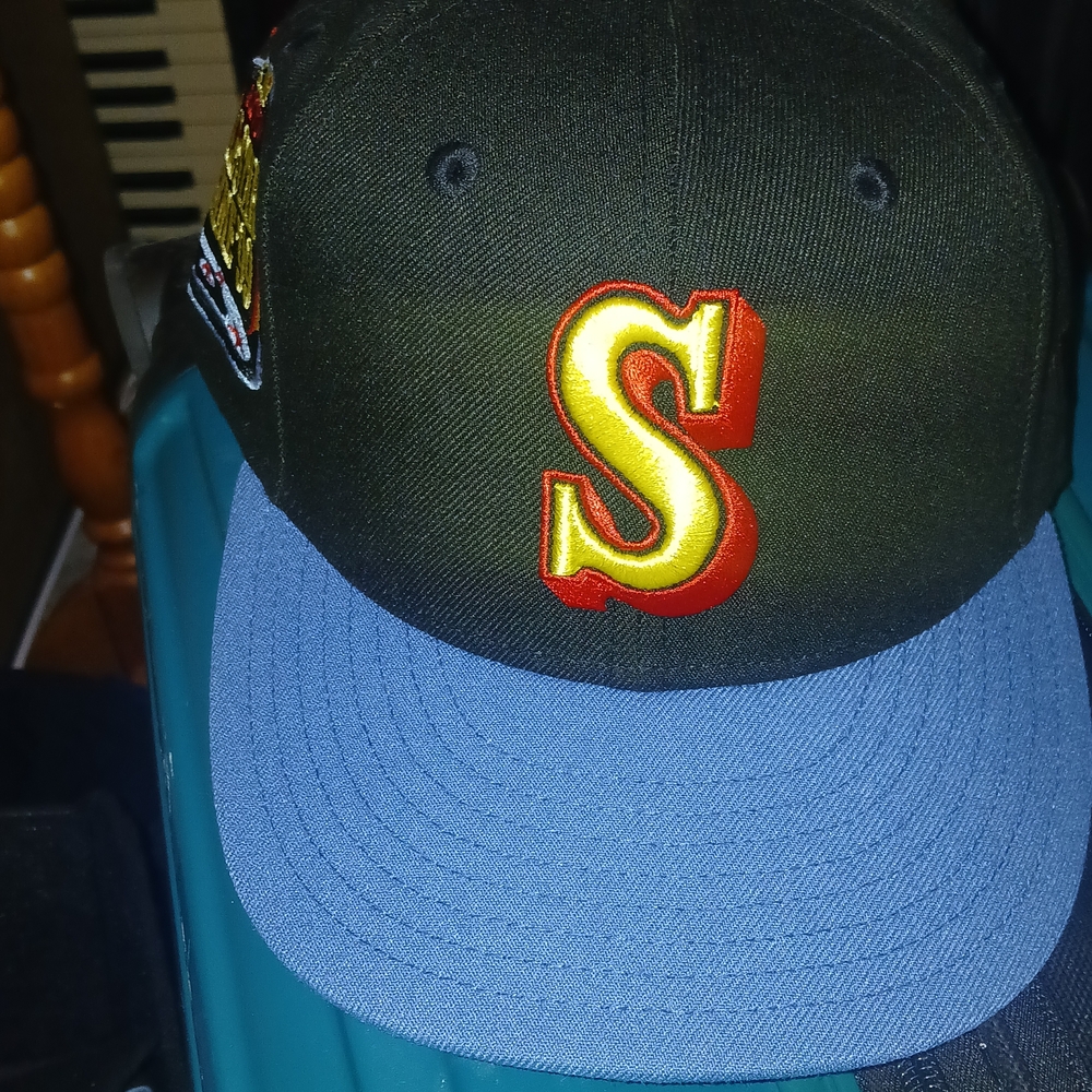 New Era Black & Light Blue 59FIFTY Fitted Cap with Yellow-Red Patch
